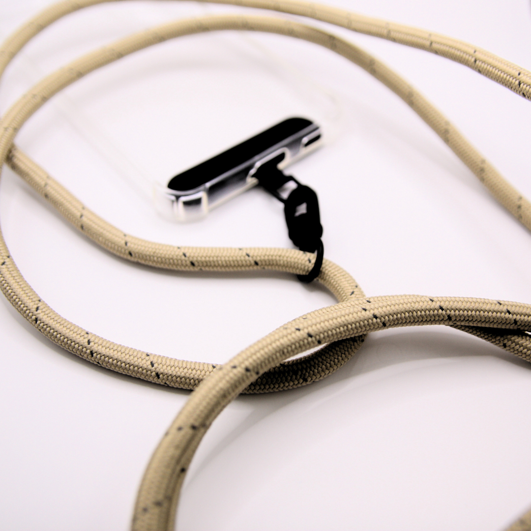 Close-up of the beige coloured crossbody phone strap rope.